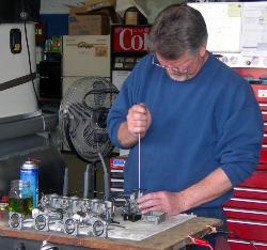 Southeastern Marine employee working on boat parts